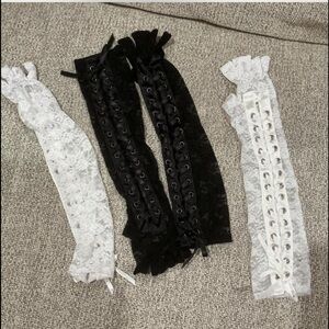 Dolls Kill Black and White Lace-Up Gloves